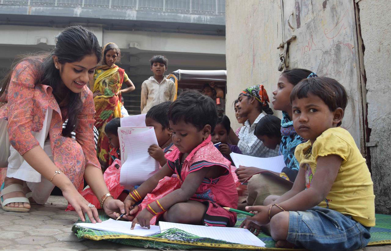 Volunteers with children